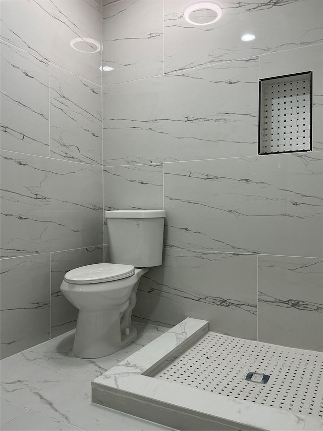 139 Miller Ave SW, Amityville, NY 11701 - full bath with marble finish flooring, toilet, and a shower stall