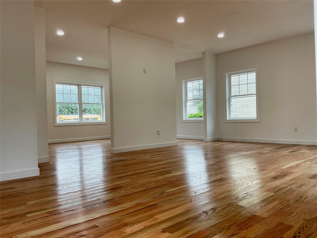 139 Miller Ave SW, Amityville, NY 11701 - spare room with light wood-type flooring, baseboards, and recessed lighting