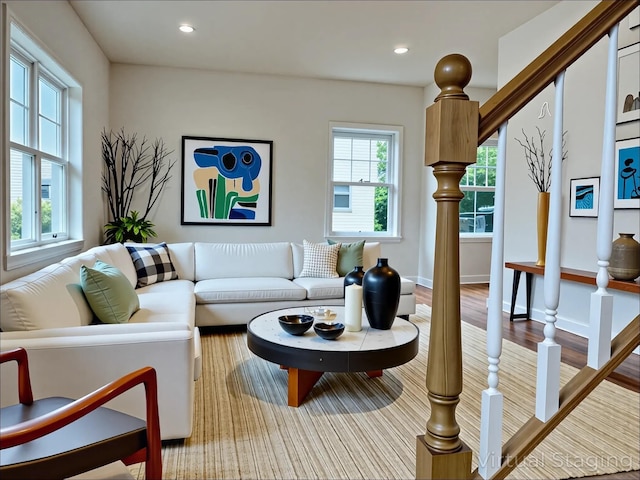 139 Miller Ave SW, Amityville, NY 11701 - living area with wood finished floors, recessed lighting, and baseboards
