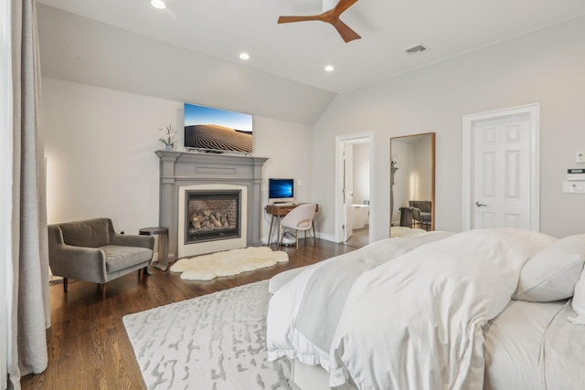 6 Murphy Ct, Blauvelt, NY 10913 - bedroom featuring a fireplace with raised hearth, vaulted ceiling, wood finished floors, recessed lighting, and a ceiling fan