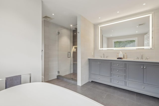 6 Murphy Ct, Blauvelt, NY 10913 - bathroom with a shower stall, double vanity, a freestanding bath, and tile patterned floors