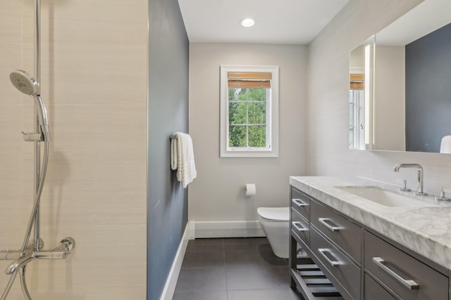6 Murphy Ct, Blauvelt, NY 10913 - bathroom with baseboards, toilet, vanity, tile patterned floors, and a tile shower