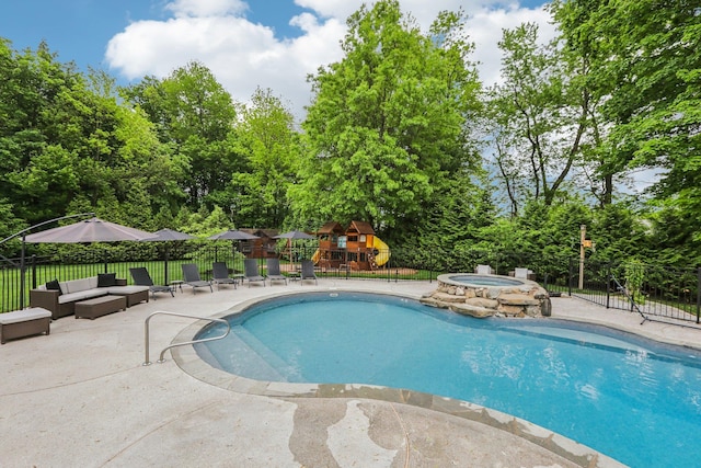 6 Murphy Ct, Blauvelt, NY 10913 - view of pool with fence, a patio area, an in-ground hot tub, an outdoor living space, and view of scattered trees