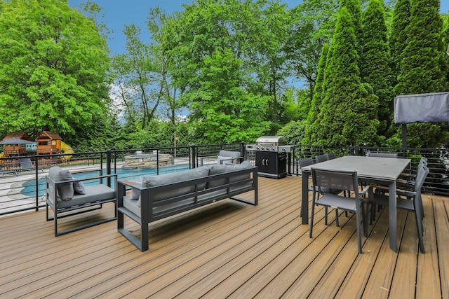 6 Murphy Ct, Blauvelt, NY 10913 - wooden deck with outdoor dining area, an outdoor hangout area, view of scattered trees, and area for grilling