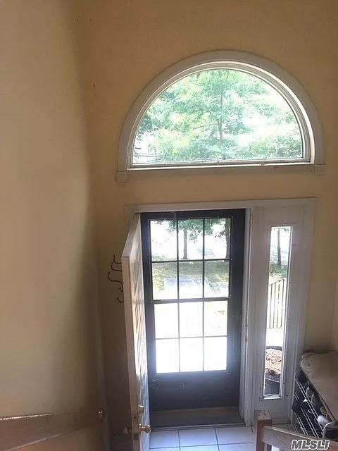 15 Oakhurst St, Huntington Station, NY 11746 - doorway featuring tile patterned floors