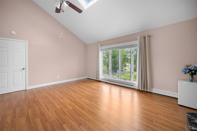 15 Oakhurst St, Huntington Station, NY 11746 - unfurnished living room featuring a ceiling fan, light wood-type flooring, a skylight, a baseboard heating unit, and high vaulted ceiling