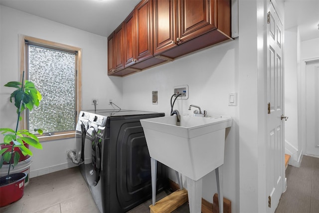 15 Oakhurst St, Huntington Station, NY 11746 - laundry room featuring washer and clothes dryer and cabinet space