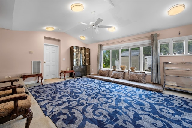 15 Oakhurst St, Huntington Station, NY 11746 - living room with ceiling fan, healthy amount of natural light, lofted ceiling, and carpet flooring