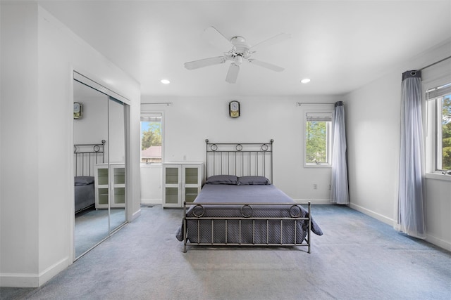 15 Oakhurst St, Huntington Station, NY 11746 - carpeted bedroom featuring multiple windows, recessed lighting, a closet, and ceiling fan