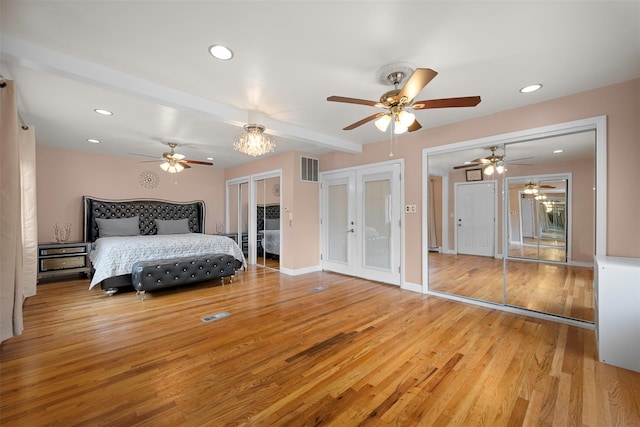 15 Oakhurst St, Huntington Station, NY 11746 - bedroom featuring wood finished floors, recessed lighting, a chandelier, beamed ceiling, and a ceiling fan