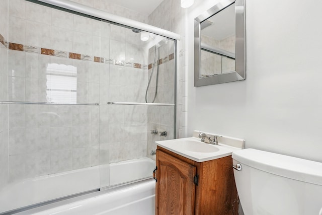 53 Howard St, Mount Vernon, NY 10550 - bathroom featuring toilet, shower / bath combination with glass door, and vanity