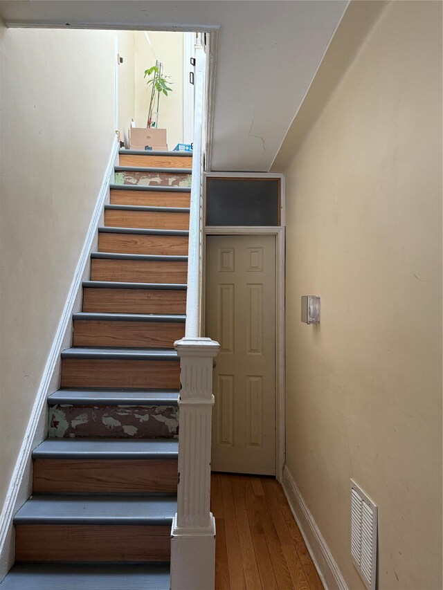 69-11 58th Rd, Maspeth, NY 11378 - staircase featuring hardwood / wood-style floors and baseboards