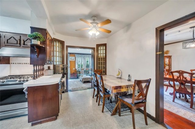 dining area with ceiling fan