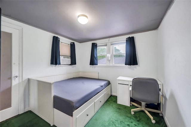 carpeted bedroom with baseboards and cooling unit