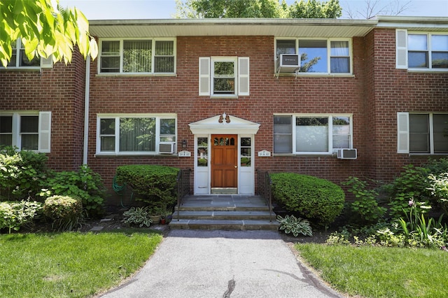 121 N Broadway Unit 22F, White Plains, NY 10603 - view of front of home featuring brick siding and cooling unit