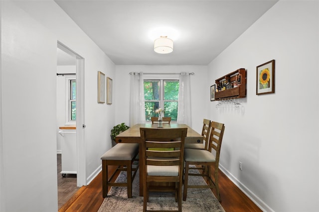 121 N Broadway Unit 22F, White Plains, NY 10603 - dining space with baseboards and wood finished floors