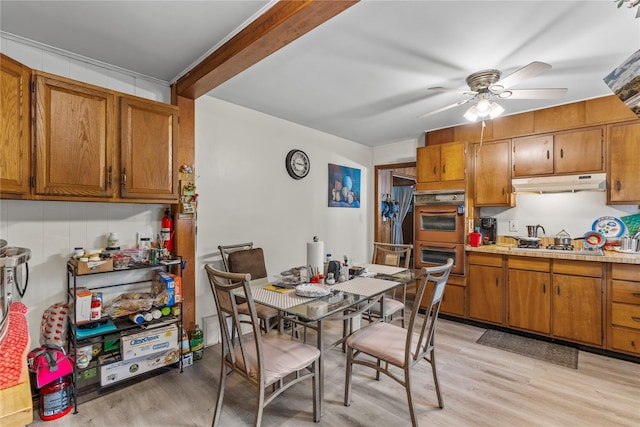 626 Union Ave, New Windsor, NY 12553 - kitchen featuring under cabinet range hood, double wall oven, and brown cabinetry