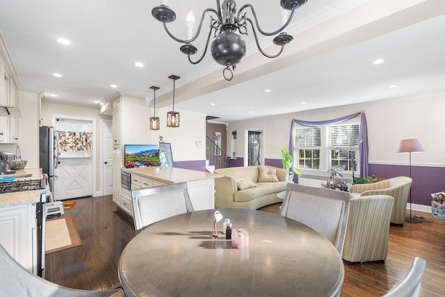 2944 Tulip Ave, Baldwin, NY 11510 - dining space featuring ornamental molding, stairs, dark wood-type flooring, a chandelier, and recessed lighting