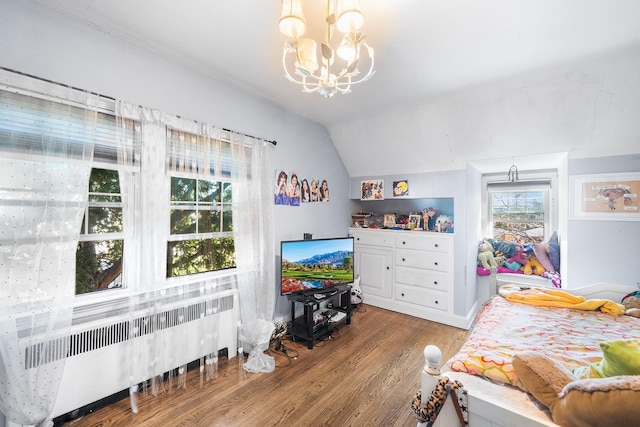 2944 Tulip Ave, Baldwin, NY 11510 - bedroom with lofted ceiling, a chandelier, wood finished floors, and multiple windows