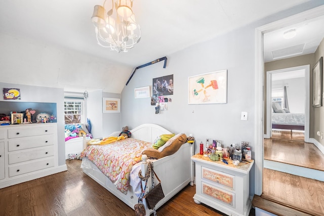 2944 Tulip Ave, Baldwin, NY 11510 - bedroom with wood finished floors, lofted ceiling, and a chandelier