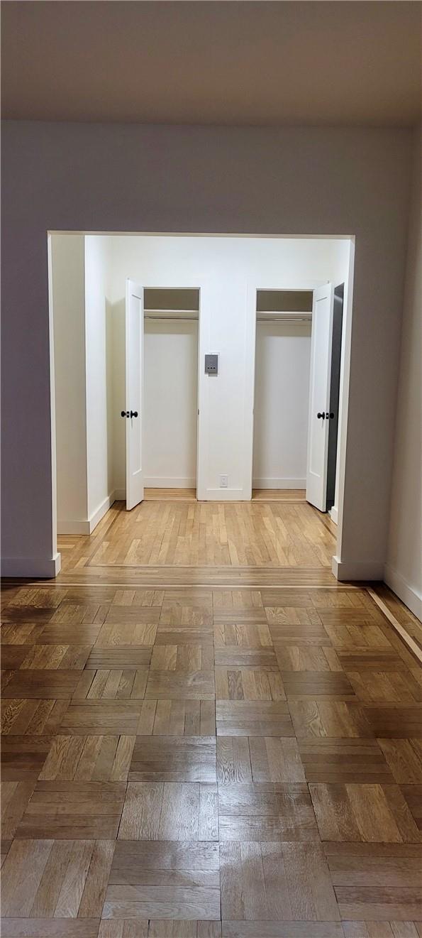 2925 Matthews Ave Unit 2H, Bronx, NY 10467 - corridor featuring baseboards