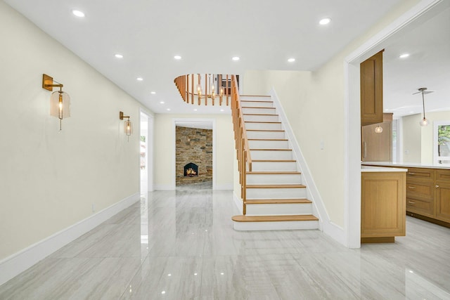 7 Mcculloch Dr, Dix Hills, NY 11746 - stairs with recessed lighting, baseboards, and a fireplace