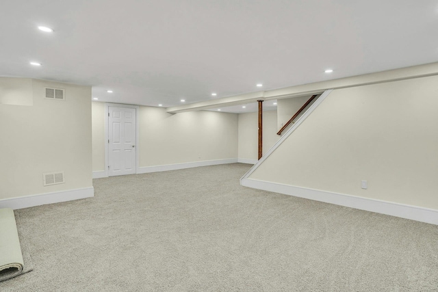 7 Mcculloch Dr, Dix Hills, NY 11746 - finished basement with recessed lighting, light colored carpet, baseboards, and stairway