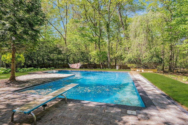 7 Mcculloch Dr, Dix Hills, NY 11746 - view of swimming pool featuring a fenced backyard, a diving board, and a patio area