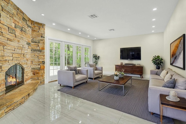 7 Mcculloch Dr, Dix Hills, NY 11746 - living room with recessed lighting, a fireplace, and tile patterned flooring