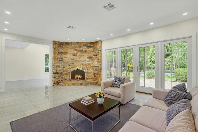 7 Mcculloch Dr, Dix Hills, NY 11746 - living room with recessed lighting, a fireplace, and tile patterned flooring
