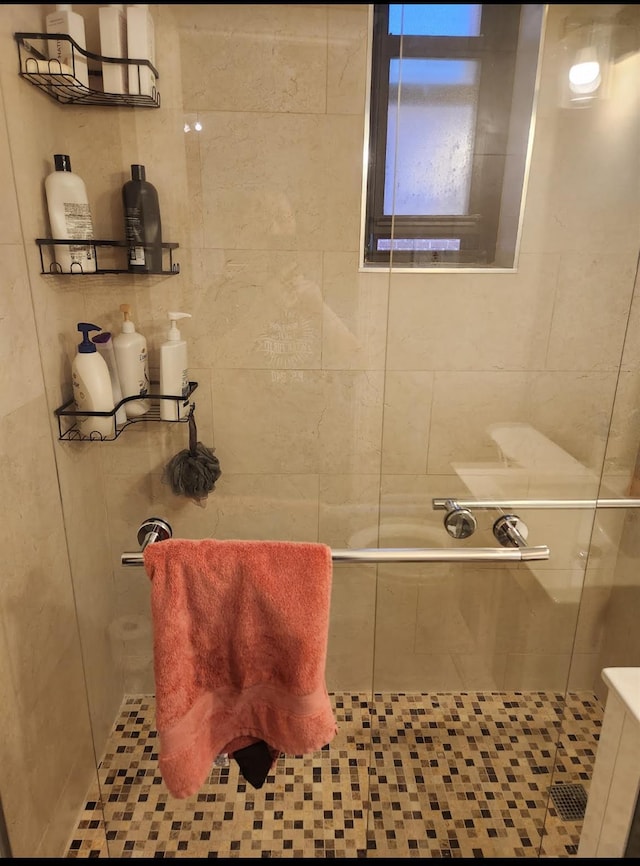 full bathroom with a shower stall