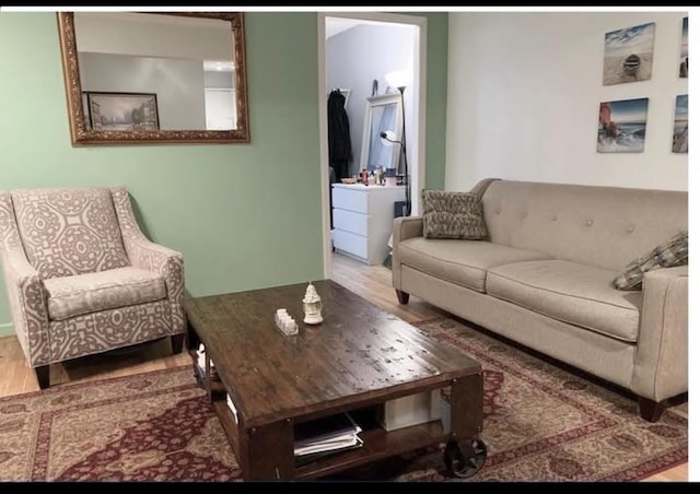 living room with wood finished floors
