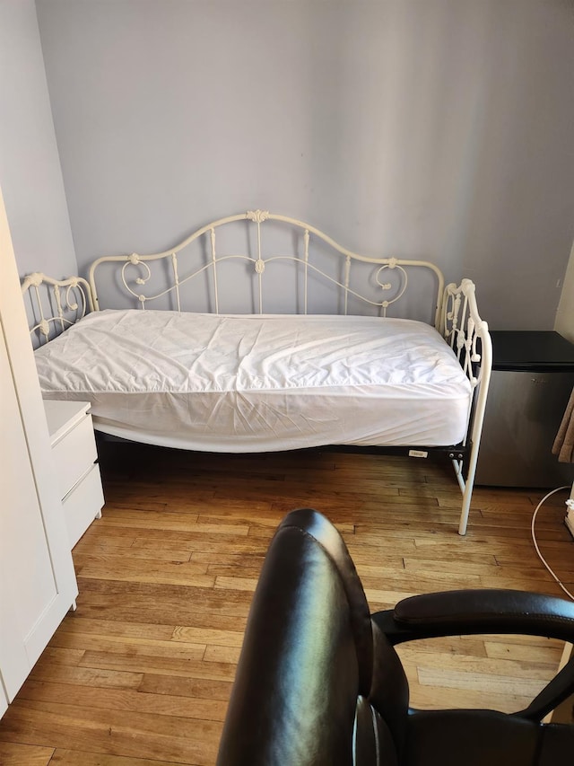 139-15 83rd Ave Unit 330, Briarwood, NY 11435 - bedroom with hardwood / wood-style floors