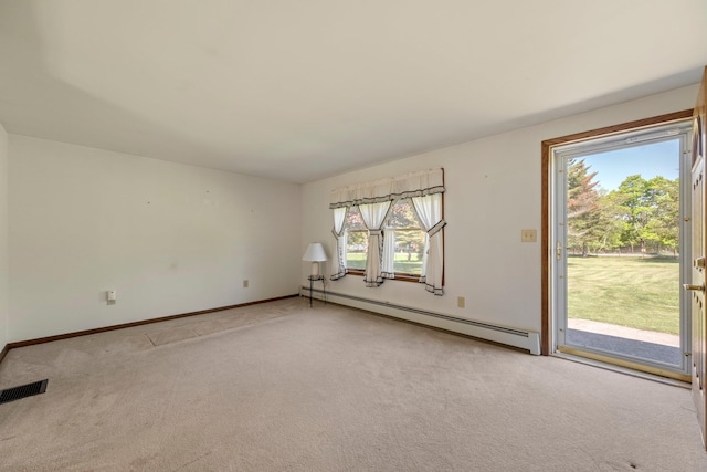 unfurnished room featuring baseboard heating, light colored carpet, and baseboards