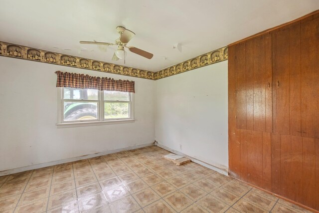spare room featuring a ceiling fan