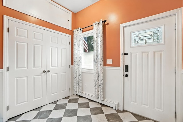 1755 Parmly Rd, Mohegan Lake, NY 10547 - foyer entrance with a baseboard radiator