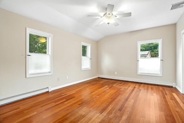 1755 Parmly Rd, Mohegan Lake, NY 10547 - unfurnished room with a baseboard heating unit, a ceiling fan, light wood-type flooring, and lofted ceiling