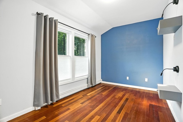 1755 Parmly Rd, Mohegan Lake, NY 10547 - unfurnished room featuring dark wood-type flooring and vaulted ceiling