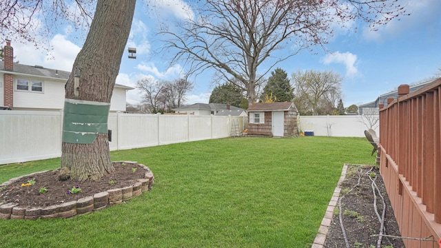 view of yard with a storage shed and an outbuilding