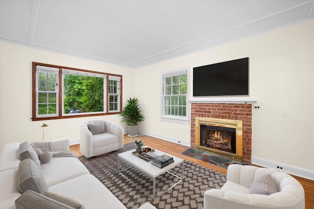 2 Ashley Rd, Hastings-On-Hudson, NY 10706 - living area featuring wood finished floors, baseboards, and a fireplace