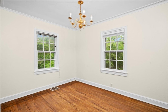 2 Ashley Rd, Hastings-On-Hudson, NY 10706 - unfurnished room featuring a chandelier, crown molding, baseboards, healthy amount of natural light, and wood finished floors