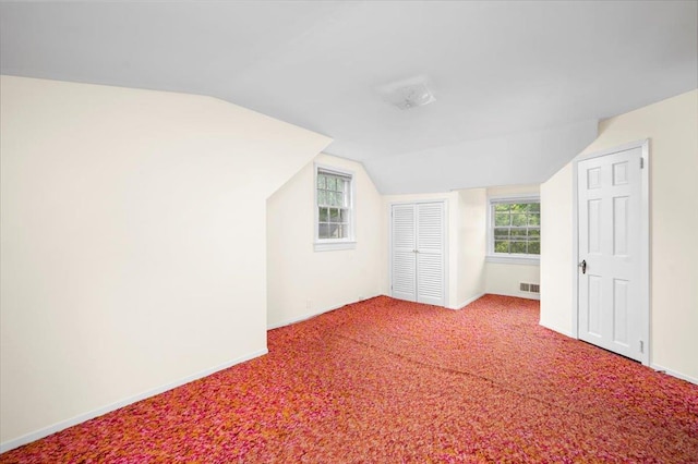 2 Ashley Rd, Hastings-On-Hudson, NY 10706 - bonus room with lofted ceiling, carpet flooring, and baseboards