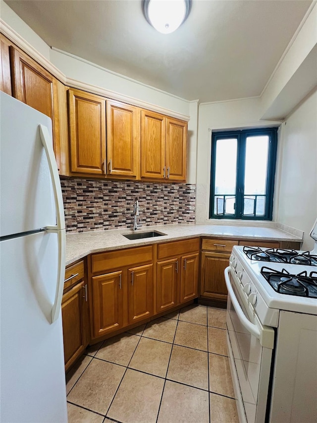 1560 Metropolitan Ave, Bronx, NY 10462 - kitchen featuring white appliances, a sink, light countertops, brown cabinetry, and tasteful backsplash
