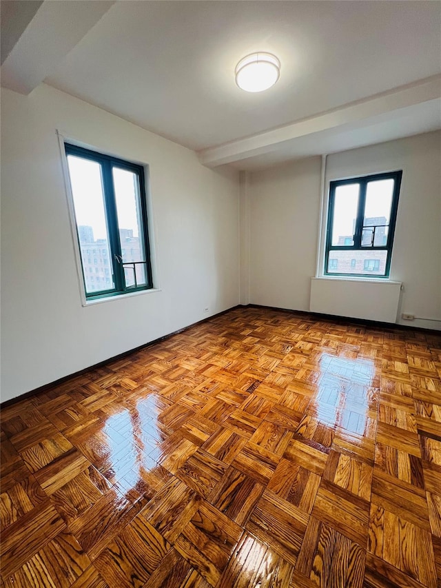 1560 Metropolitan Ave, Bronx, NY 10462 - spare room featuring plenty of natural light and radiator