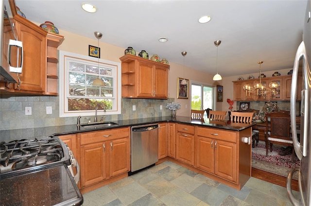 1793 Brian Ct, South Merrick, NY 11566 - kitchen with appliances with stainless steel finishes, open shelves, a sink, a peninsula, and backsplash