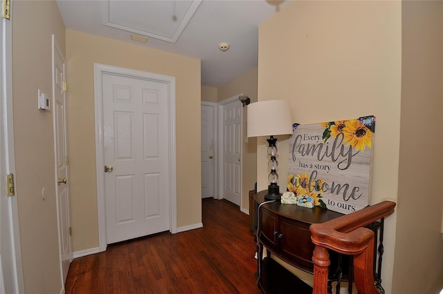 1793 Brian Ct, South Merrick, NY 11566 - hall featuring wood finished floors, baseboards, and attic access