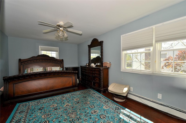 1793 Brian Ct, South Merrick, NY 11566 - bedroom with wood finished floors, a baseboard heating unit, multiple windows, and ceiling fan
