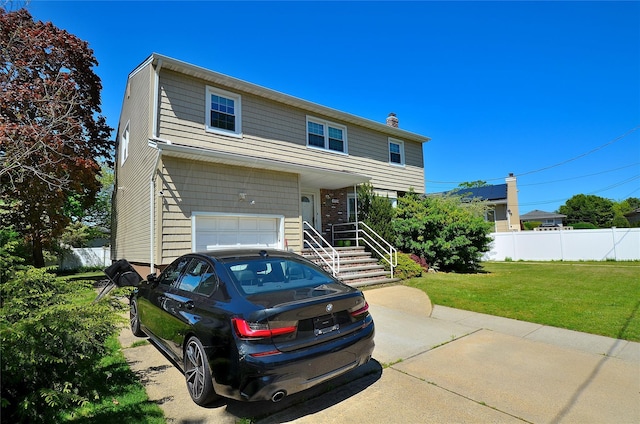 1793 Brian Ct, South Merrick, NY 11566 - view of front facade with a garage and a chimney
