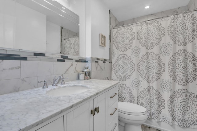 220 Boundary Ave, Massapequa, NY 11758 - full bathroom featuring vanity, toilet, recessed lighting, shower / tub combo with curtain, and tile walls