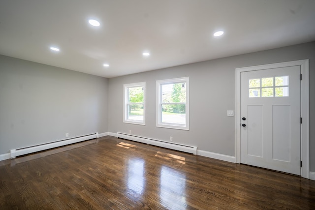 23 Wheat Path Rd W, Mount Sinai, NY 11766 - foyer entrance with a baseboard heating unit, baseboard heating, baseboards, recessed lighting, and wood finished floors